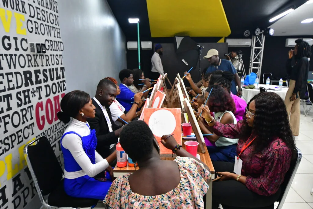 Participants painting at an Art for Liberty session